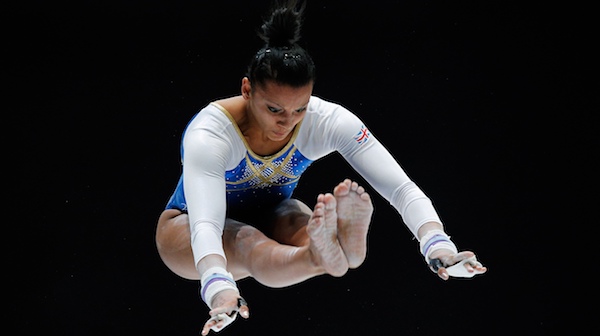 Becky Downie competes in the women's uneven bars at the Artistic Gymnastics World Championships